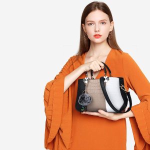 Color-blocked decorative handbag