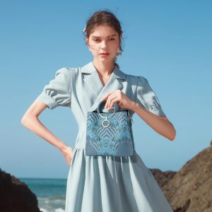 Light blue retro striped handbag