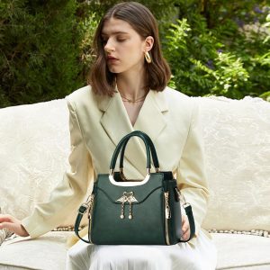 Dark green swan pendant handbag